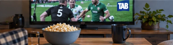 Rugby match shown on a television in a New Zealand living room